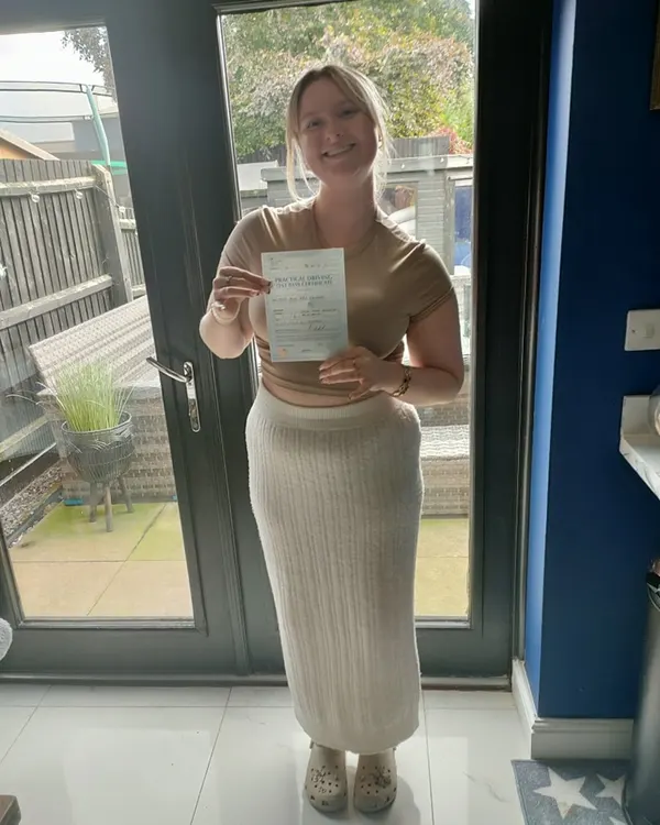 Driving test pass photo — happy learner after passing with Jamie Almond
