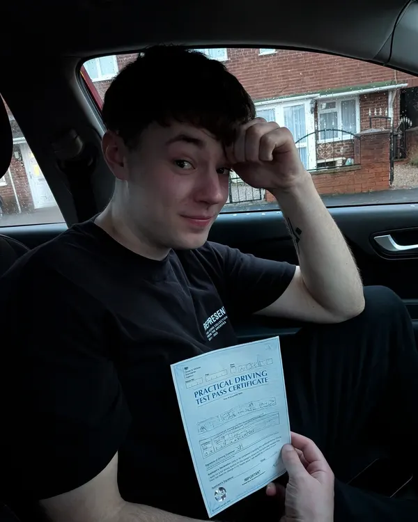 Pass certificate photo after driving lessons with Jamie Almond