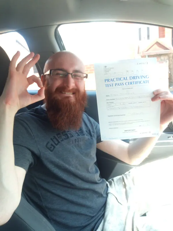 Successful learner driver after passing the practical driving test